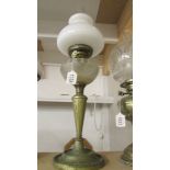 An old oil lamp with frosted glass font and opaque glass shade. COLLECT ONLY.