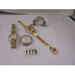 A Rado Shangri-La ladies date watch, A silver Teddy bear watch/clock holder and a Rotary watch.