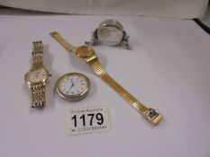 A Rado Shangri-La ladies date watch, A silver Teddy bear watch/clock holder and a Rotary watch.