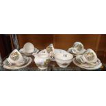 A Royal Vale porcelain thatched cottage pattern 18 piece tea set