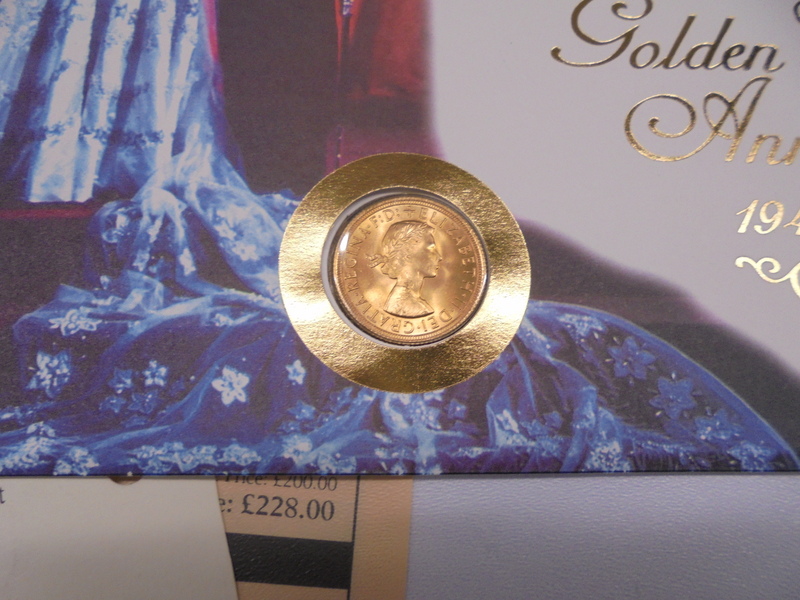 A Queen Elizabeth II Golden Wedding coin cover with a 1958 gold sovereign. - Image 3 of 3
