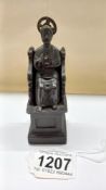 A bronze statue of St Peter on his throne, 11.5 cm tall.