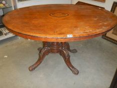 A Victorian oval mahogany inlaid tip top table, COLLECT ONLY.