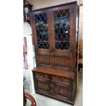 A dark oak bureau bookcase drinking cabinet with drapery front COLLECT ONLY