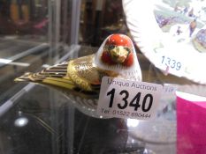 A Royal Crown Derby Goldfinch paperweight with gold stopper.