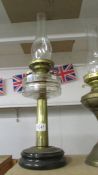 An old oil lamp on pot base with brass column, glass font and chimney, COLLECT ONLY.