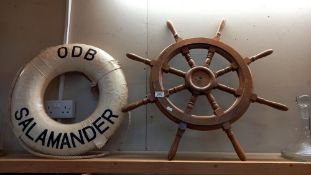 A wooden ships wheel & a life buoy names 'ODB SALAMANDER' COLLECT ONLY