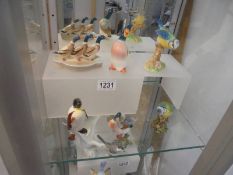 Six Beswick duck and blue tit figures.