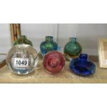 Six studio glass bud vases in various colours.