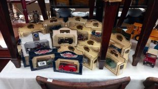 A large collection of approximately 39 boxed Lledo days gone and Vanguards diecast models