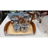 A good Piquot ware tea set with teapot, water pot, milk sugar & tray