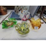 Four pieces of heavy coloured art glass.