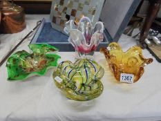 Four pieces of heavy coloured art glass.