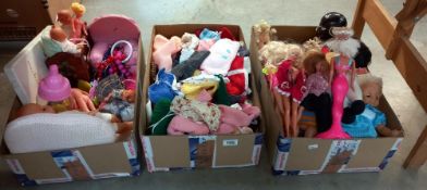 3 boxes of dolls, dolls clothes etc, contains 3 Barbies