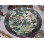 A large hand painted Chinese charger, 45.5 cm diameter (has age related crazing).