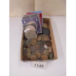 A good lot of pre 1900 coins, a quantity of farthings and some commemorative coins.