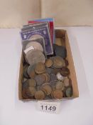 A good lot of pre 1900 coins, a quantity of farthings and some commemorative coins.