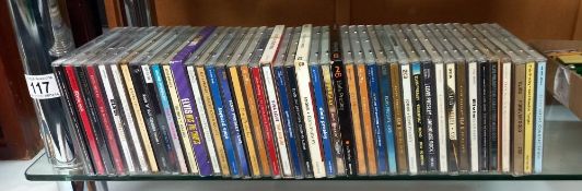 A collection of nearly 50 Elvis CD's