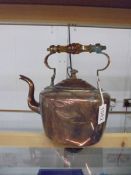 A Victorian oval copper kettle.