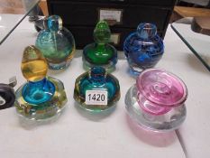 Four coloured glass specimen vases and two scent bottles.