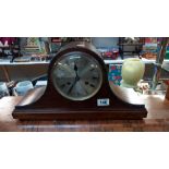 A 1930's oak mantle clock