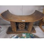 A carved wood tribal stool, COLLECT ONLY.