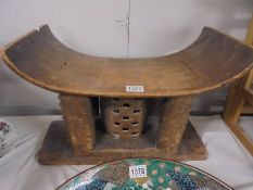 A carved wood tribal stool, COLLECT ONLY.