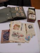 A mixed lot of tea/cigarette cards and vintage greeting cards etc.,