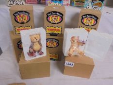 Eight boxed Bad Taste Bears.