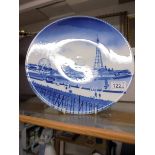 A large early 20th century blue and white wall plate featuring Blackpool fron North Pier, 31 cm dia.