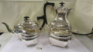 A four piece silver tea set, 50 ounces including handles.