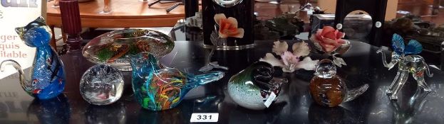 A quantity of multi coloured glass animals including paperweights etc