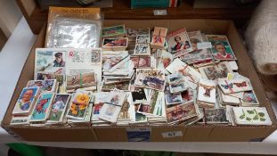 A box of cigarette and collectors cards including Topps chewing gum, football cards