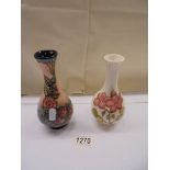 Two Moorcroft vases.