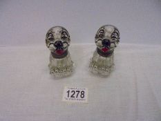 Two novelty Bonzo dog glass inkwells (both have chips and cracks).