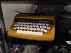 A cased Petite typewriter