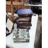 A quantity of Bernard Cornwell military novels (hard & paperbacks) & a quantity of true story war