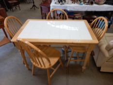 A white tile top table & 4 chairs COLLECT ONLY