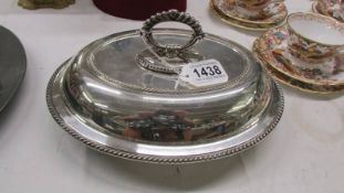 A silver plate vegetable tureen.