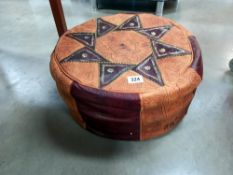 A leather pouffe COLLECT ONLY