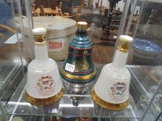 Three Wade Bells whisky decanters with contents. COLLECT ONLY