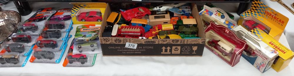 A box of mixed die cast including Matchbox etc.