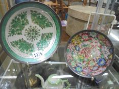 Two Japanese painted pewter mounted plates by T.F.F.