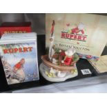 A boxed Royal Doulton Rupert figure "Captain Rupert" and a boxed Rupert money box