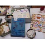A mixed lot of stamps in albums and loose including first day covers.