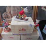 A boxed Royal Doulton Rupert figure "Tempted to Trespass" and a boxed Rupert money box