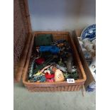 A large basket of vintage toys, mainly plastic soldiers including cowboys etc. COLLECT ONLY
