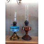 A Victorian oil lamp with painted blue glass font & Aladdin paraffin lamp COLLECT ONLY