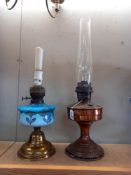 A Victorian oil lamp with painted blue glass font & Aladdin paraffin lamp COLLECT ONLY