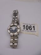 A ladies quartz wrist watch marked TB 7A980R.